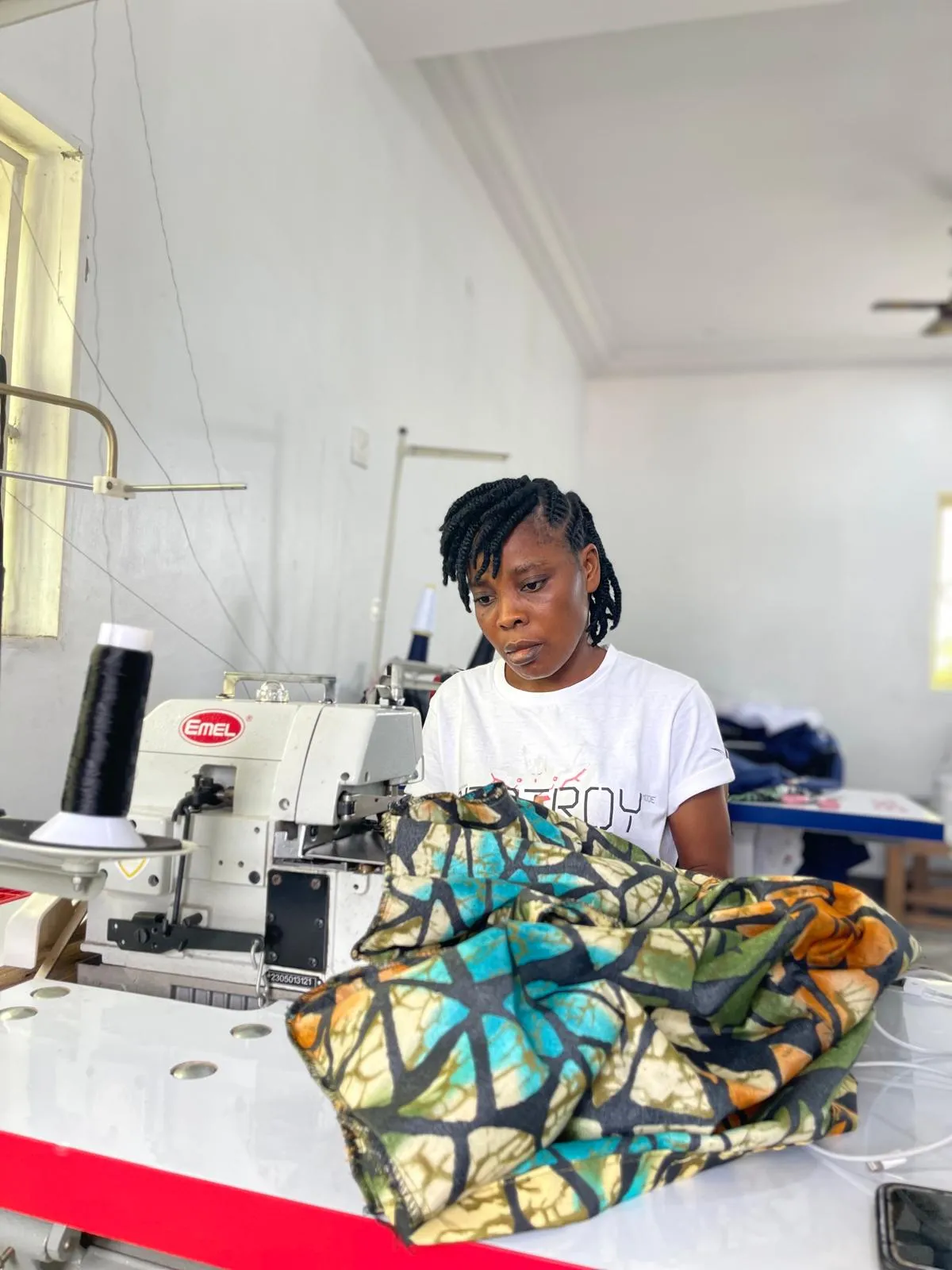 Skills training at the sewing machine, J&J Ante Fashion Center