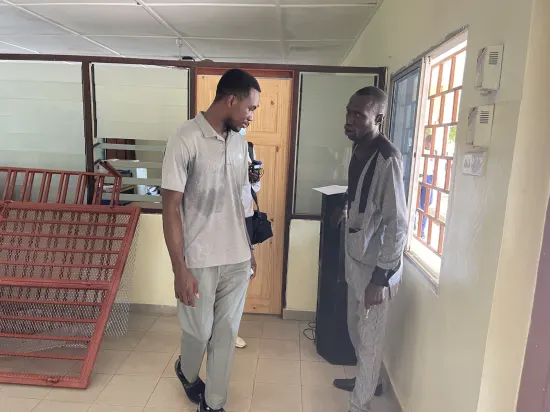Foundation team visiting school staff, classrooms and library, The Gambia, 2022