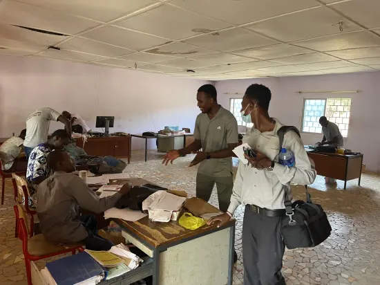 Foundation team visiting school staff, classrooms and library, The Gambia, 2022