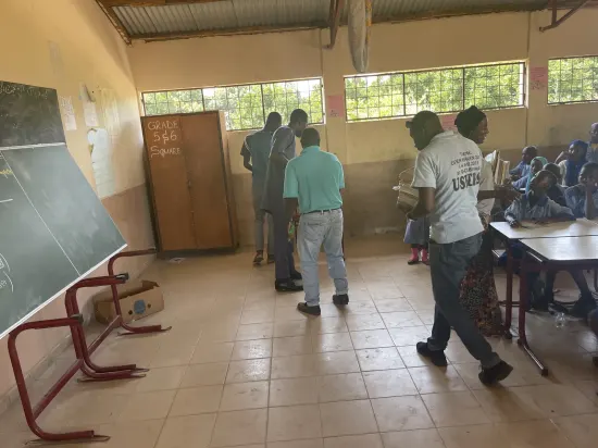 Foundation team visiting school staff, classrooms and library, The Gambia, 2022