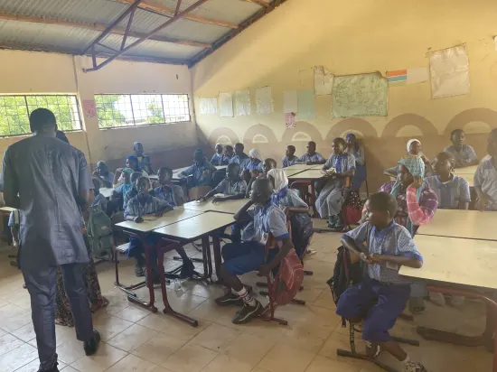 Foundation team visiting school staff, classrooms and library, The Gambia, 2022
