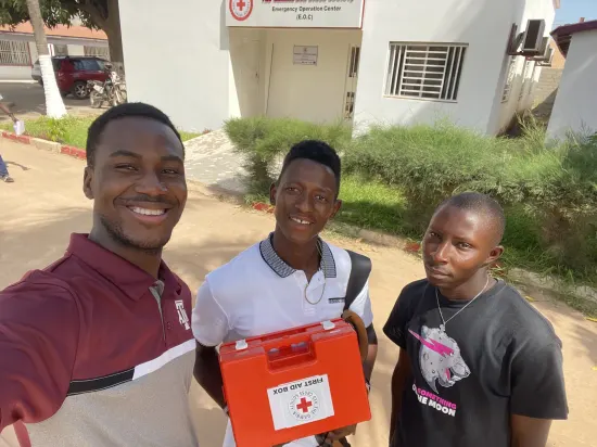 Foundation team with a donated first aid kit, The Gambia, 2022