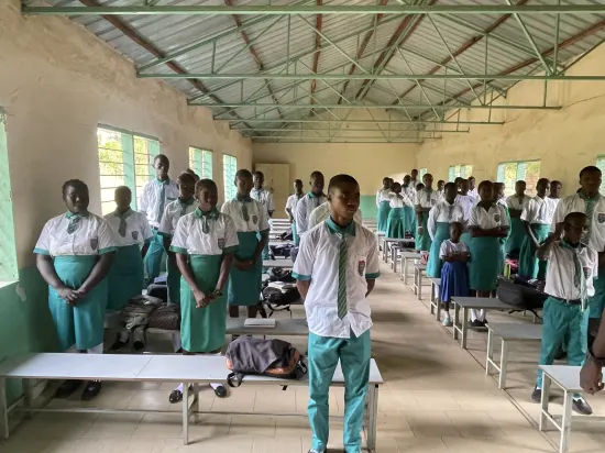 Speaker leading a prayer session with secondary school students, The Gambia, 2022