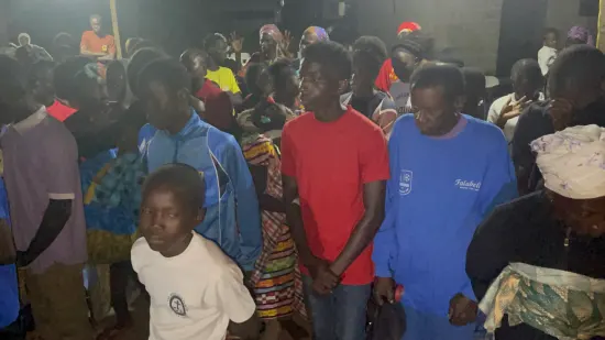 Evening outreach service with the community, The Gambia, 2022