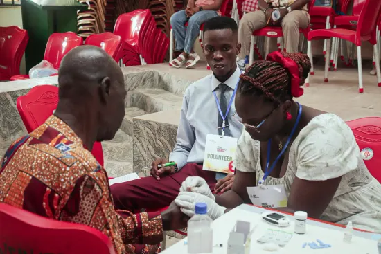 Clinicians consulting with a patient